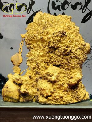 Di Lặc ngũ tiểu vác đào nu hương.