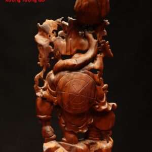 Di Lặc tam tiểu vác cành đào.