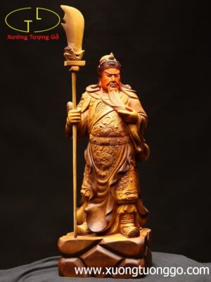 Quan Công chống đao gỗ bách xanh.