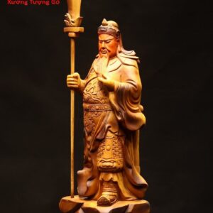 Quan Công chống đao gỗ bách xanh.