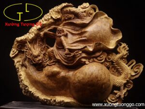 Đạt Ma hàm long gỗ nu hương.