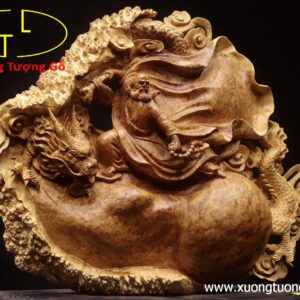 Đạt Ma hàm long gỗ nu hương.