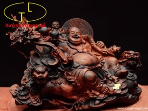Di lặc nhất tiểu vác đào song nghê gỗ trắc