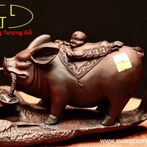 Nhị tiểu dắt heo gỗ trắc