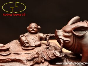 Nhị tiểu dắt heo gỗ trắc