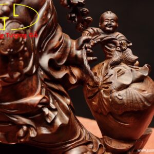 Di Lặc nhị tiểu vác đào gỗ cẩm.