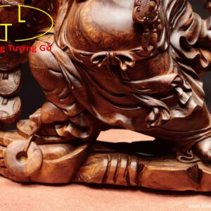 Di Lặc nhị tiểu vác đào gỗ cẩm.