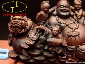 Di Lặc ngũ tiểu song nghê gỗ trắc.