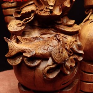 Di Lặc đứng bao tiền cá chép gỗ hương.