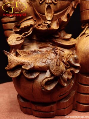 Di Lặc đứng bao tiền cá chép gỗ hương.