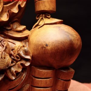 Di Lặc đứng bao tiền cá chép gỗ hương.