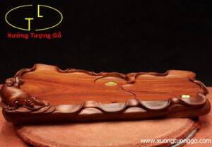 Khay trà nghê gỗ hương ta.