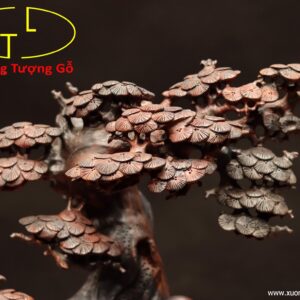 Di Lặc ngồi voi gỗ trắc.