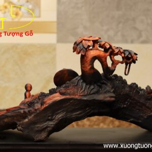 Nhất tâm bái Phật( tượng Phật gỗ) trắc
