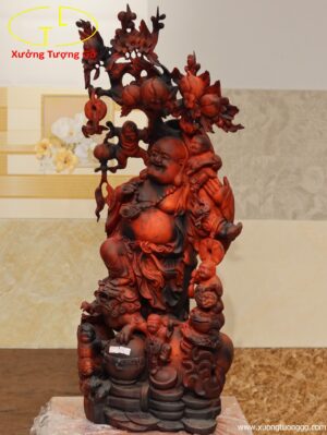 Di Lặc đứng bao ngũ tiểu( ngũ phúc) vác cành đào gỗ trắc.