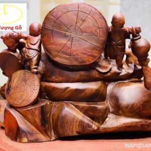 Di Lặc ngũ tiểu ngồi đống tiền gỗ cẩm.