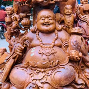 Di Lặc cửu tiểu ngồi tùng gỗ hương ta.