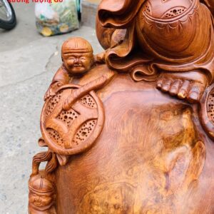 Di Lặc Cửu tiểu ngồi bao tiền nu hương.