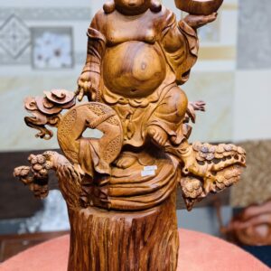 Di Lặc đứng tùng cầm vàng gỗ hương
