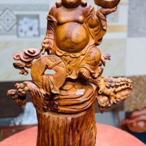 Di Lặc đứng tùng cầm vàng gỗ hương