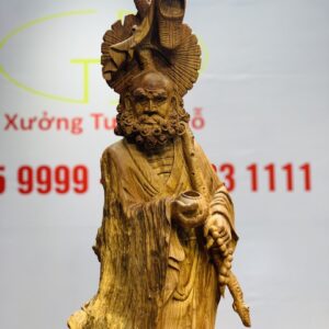 Đạt ma đứng gỗ hương.