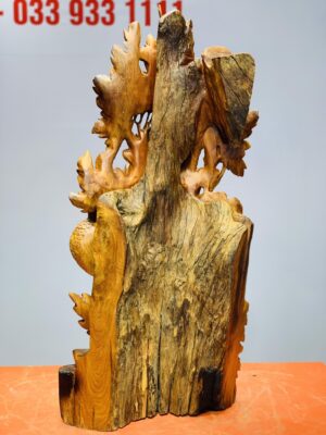 Phu thê viên mãn gỗ hương ta.