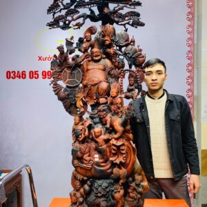 Di Lặc cửu tiểu vác đào đứng tùng gỗ trắc