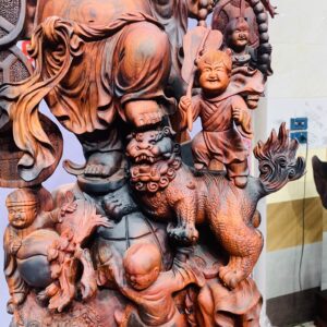 Di Lặc cửu tiểu vác đào đứng tùng gỗ trắc