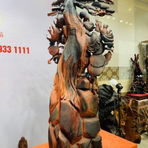 Di Lặc cửu tiểu vác đào đứng tùng gỗ trắc