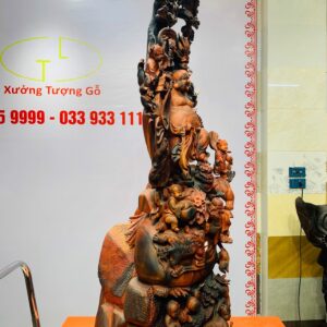 Di Lặc cửu tiểu vác đào đứng tùng gỗ trắc