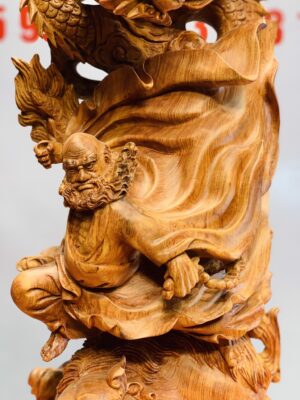 Đạt Ma cưỡi nghê rồng gỗ hương đá