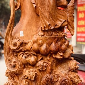 Quan Âm ban phước gỗ hương ta.