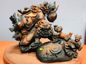 Di Lặc nhị tiểu ngồi nghê