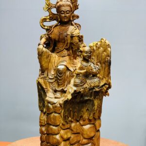 Quan âm ngồi thiền nhất tiểu gỗ hương.