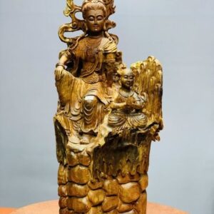 Quan âm ngồi thiền nhất tiểu gỗ hương.