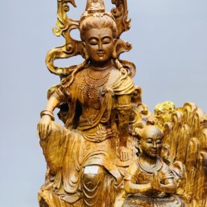 Quan âm ngồi thiền nhất tiểu gỗ hương.
