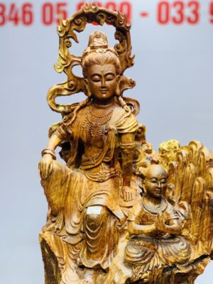 Quan âm ngồi thiền nhất tiểu gỗ hương.