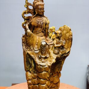 Quan âm ngồi thiền nhất tiểu gỗ hương.