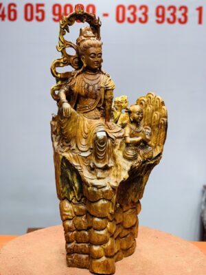 Quan âm ngồi thiền nhất tiểu gỗ hương.