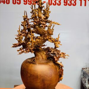 Bình mai gỗ hương ta.