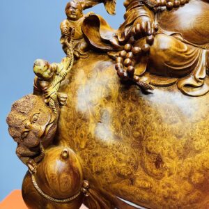 Di lặc vác đào ngồi bao nu hương.