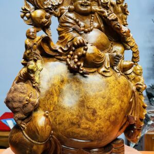 Di lặc vác đào ngồi bao nu hương.