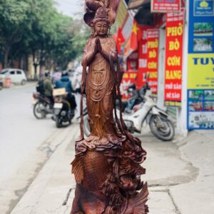 Quan Âm ngự cá chép hóa rồng gỗ cẩm.