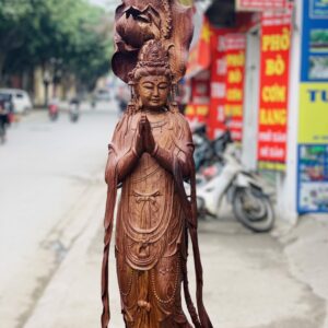 Quan Âm ngự cá chép hóa rồng gỗ cẩm.