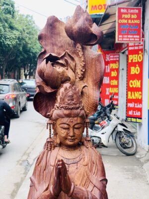 Quan Âm ngự cá chép hóa rồng gỗ cẩm.