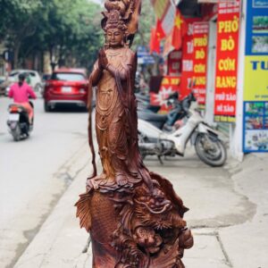 Quan Âm ngự cá chép hóa rồng gỗ cẩm.