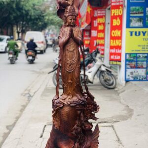 Quan Âm ngự cá chép hóa rồng gỗ cẩm.