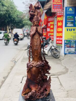 Quan Âm ngự cá chép hóa rồng gỗ cẩm.