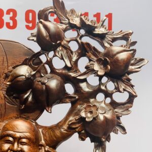 Di Lặc ngũ tiểu vác đào gỗ cẩm.