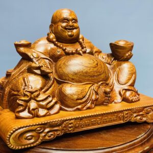 Di Lặc cầm vàng, ngọc như ý gỗ hương đá
